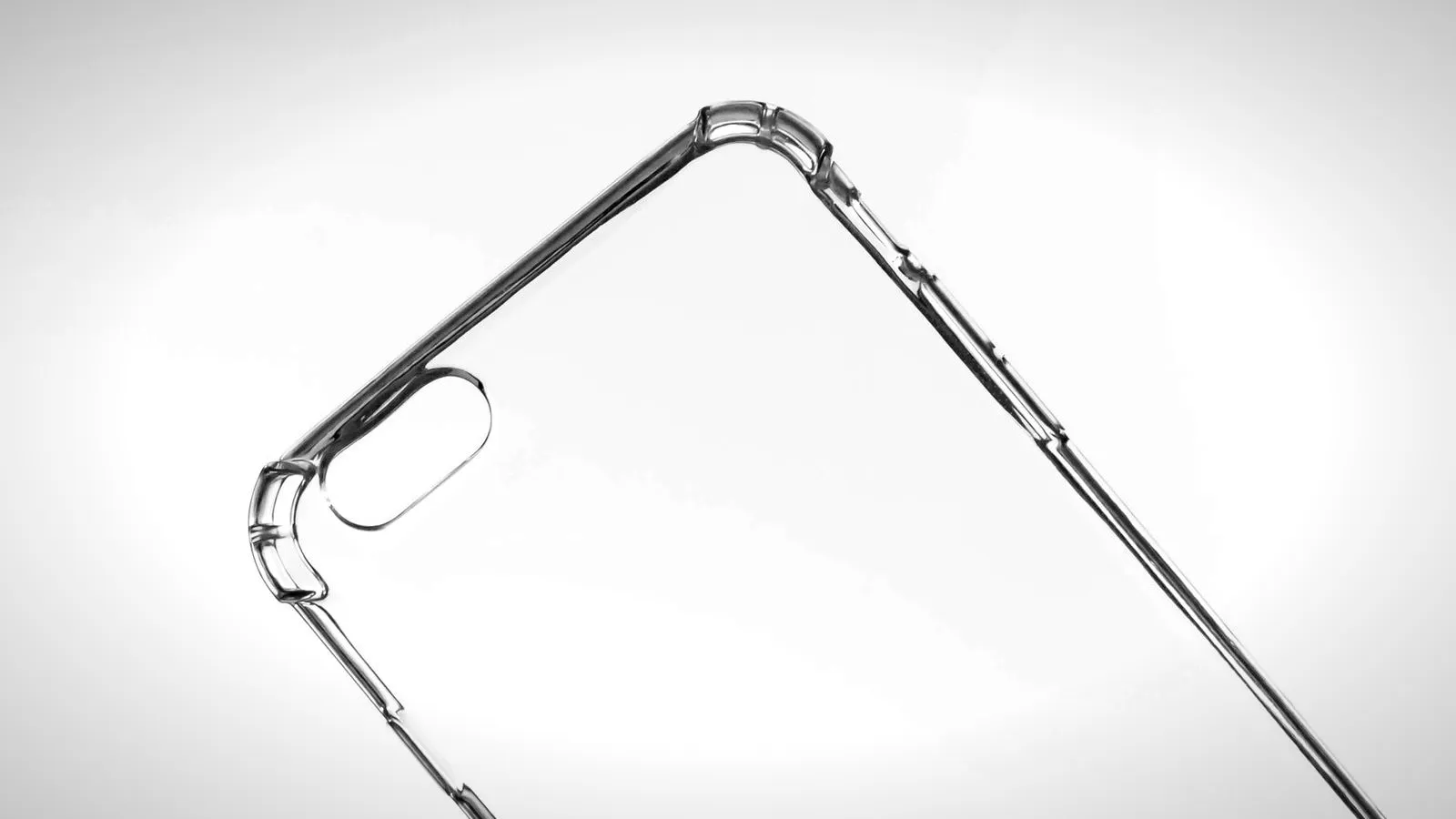 A clear flexible phone case with thicker, cushioned corners on a white background